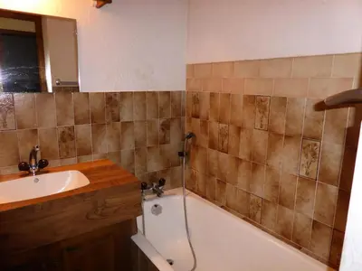 a bathroom with a sink and a bath tub and a sink at Résidence Princesse En Etraz Narcisse - Princesse en Etraz N34 MAE-2284 in Combloux