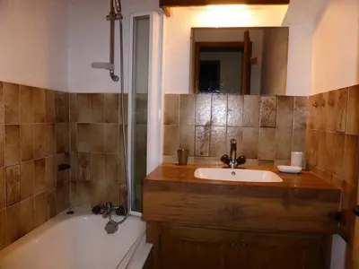 a bathroom with a sink and a bath tub at Résidence Princesse En Etraz Narcisse - Princesse en Etraz N41 MAE-2294 in Combloux