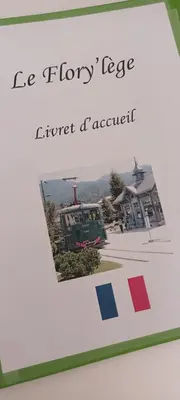 a book with a picture of a helicopter at Le Flory'lège in Saint-Gervais-les-Bains