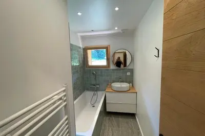 an overhead view of a hallway in a wooden house at Semi Detached Chalet For 8 With Balcony & Garden in Chamonix-Mont-Blanc