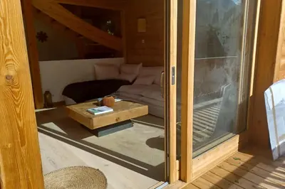 a mountain in the distance with a house and trees at Semi Detached Chalet For 8 With Balcony & Garden in Chamonix-Mont-Blanc