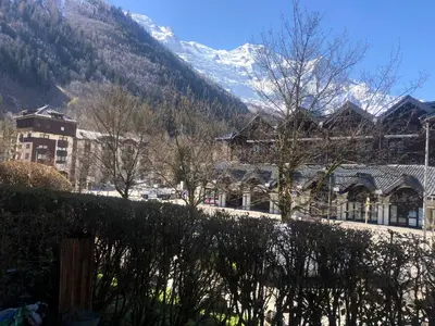 a view of a town with a snow covered mountain at Chamonix 27 - Au Centre Vue Mont Blanc et Jardin in Chamonix-Mont-Blanc