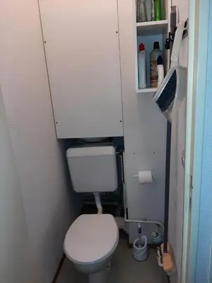 a small bathroom with a toilet in a small room at L'enclaves in Les Contamines-Montjoie