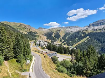 an aerial view of a road in the mountains at Appartement spacieux, accès pistes, piscine, spa - FR-1-425-120 in Flaine