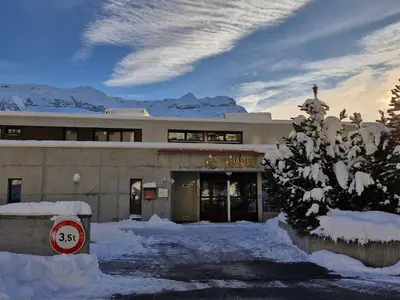 a building with snow in front of it at Appartement spacieux au centre, balcon, animaux acceptés - FR-1-425-130 in Flaine