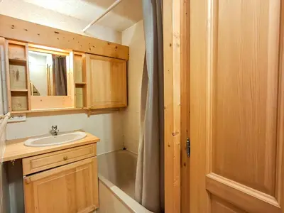 a bathroom with a sink and a shower at Appartement 3 pièces confortable au centre de Flaine avec terrasse - FR-1-425-135 in Flaine
