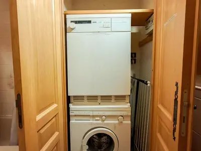 a washer and dryer in a tiny house at Appartement 3 pièces confortable au centre de Flaine avec terrasse - FR-1-425-135 in Flaine