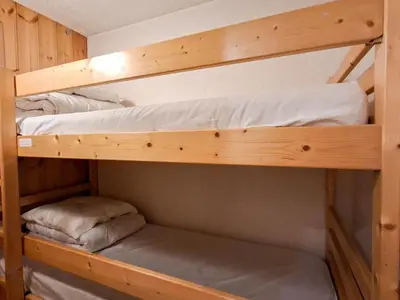 a couple of bunk beds in a cabin at Appartement 3 pièces confortable au centre de Flaine avec terrasse - FR-1-425-135 in Flaine