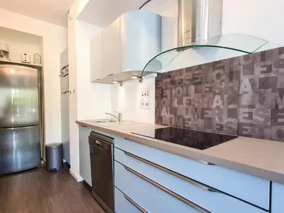 a kitchen with a sink and a counter top at Appartement lumineux au pied des pistes avec piscine et spa - FR-1-425-133 in Flaine