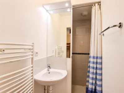 a bathroom with a sink and a shower at Appartement lumineux 6 pers à Flaine avec balcon et options parking - FR-1-425-149 in Flaine