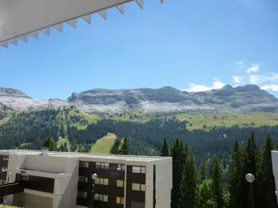 a view of the mountains from a building at Studio neuf pour 4 pers. au centre de Flaine avec balcon - FR-1-425-170 in Flaine