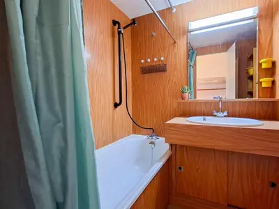 a bathroom with a tub and a sink and a mirror at Studio lumineux 4 pers avec balcon, Flaine - FR-1-425-163 in Flaine