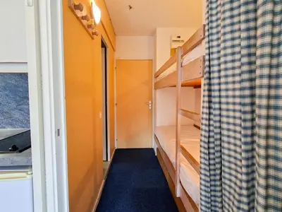 a small room with a bunk bed and a curtain at Studio lumineux 4 pers avec balcon, Flaine - FR-1-425-163 in Flaine