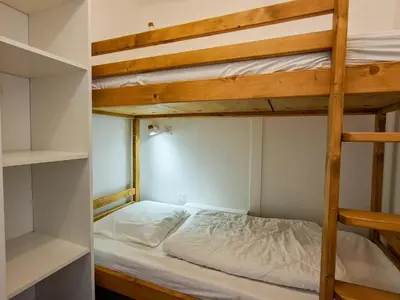 a room with two bunk beds in it at Appartement lumineux au centre avec balcon et parking - FR-1-425-177 in Flaine