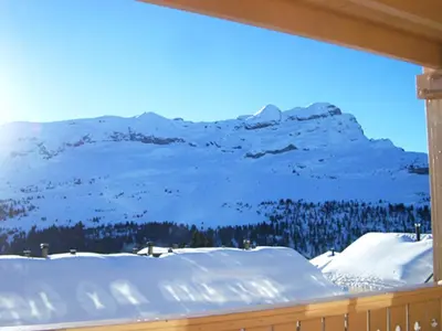 a view of a snow covered mountain from a window at Studio lumineux avec balcon - Flaine - FR-1-425-160 in Flaine