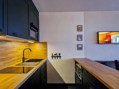 a kitchen with a sink and a counter at Studio lumineux avec balcon - Flaine - FR-1-425-160 in Flaine