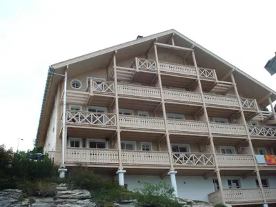 a building with balconies on the side of it at Studio lumineux avec balcon - Flaine - FR-1-425-160 in Flaine
