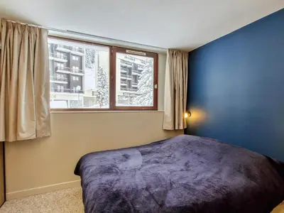 a bedroom with a large bed and a window at Appartement Sud Confort 4-5 pers, Balcon, Proche pistes - FR-1-425-173 in Flaine