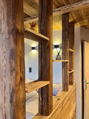 a room with wooden walls and wooden shelves at Le Nid de l'Aiguille - Au pied de l'Aiguille du midi in Chamonix-Mont-Blanc