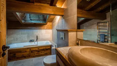 a bathroom with a shower with a glass door at Chalet Entre Nous in Chamonix-Mont-Blanc