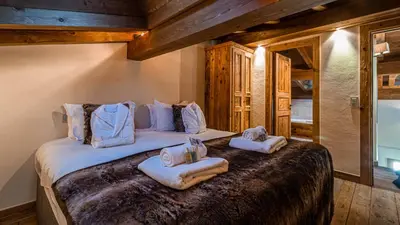 a bathroom with a tub and a toilet and a sink at Chalet Entre Nous in Chamonix-Mont-Blanc