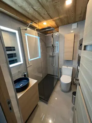 a small bathroom with a shower and a toilet at Le Sapin B19 Megeve - Demi Quartier in Megève