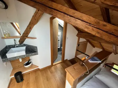 an overhead view of a kitchen in a tiny house at un nid sous les toits in Saint-Gervais-les-Bains