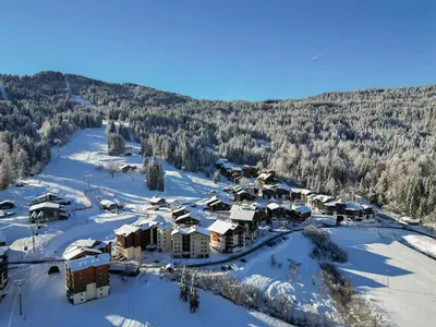 three people on a ski lift in the mountains at Appartement de 60 m² pour 6 personnes, pied des pistes - FR-1-642-71 in Morillon