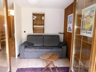 a living room with a couch and a table at Résidence Palmes D'or - Palmes d'Or B109 MAE-5504 in Les Contamines-Montjoie