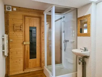 a bathroom with a shower and a sink at Chalet lumineux · Sauna privatif · Garage · 12 personnes - FR-1-425-119 in Arâches-la-Frasse
