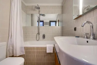 a bathroom with a sink and a shower at Chalet Safari. Face au Mont-Blanc. in Chamonix-Mont-Blanc