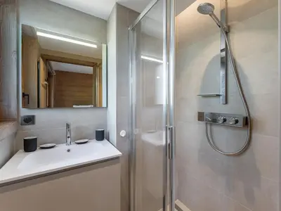 a bathroom with a sink and a shower at Appartement de Standing à Megève, 5 Min des Pistes, Sauna, Hammam, Parking, Animaux Acceptés - FR-1-569-52 in Megève