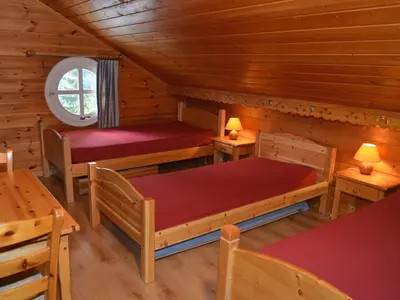 a room with benches and tables in a cabin at Duplex Confortable 3P - 6/8 Pers - Balcon - FR-1-425-127 in Arâches-la-Frasse