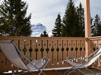 two chairs on a deck with a mountain in the background at Duplex Confortable 3P - 6/8 Pers - Balcon - FR-1-425-127 in Arâches-la-Frasse