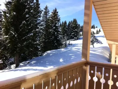 a balcony with snow on the ground and trees at Duplex Confortable 3P - 6/8 Pers - Balcon - FR-1-425-127 in Arâches-la-Frasse