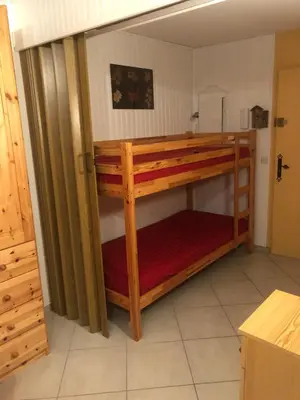 a couple of bunk beds in a room at Studio Les Carroz in Les Carroz d'Araches