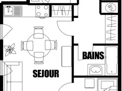 a kitchen with a table and chairs in a room at 3 Pièces au pied des pistes pour 4 personnes à Morillon - FR-1-815-84 in Morillon