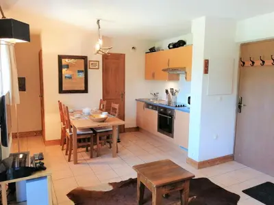 two twin beds in a room with two night stands at Appartement 3 pièces, 6 personnes, proche pistes de ski, Wi-Fi - FR-1-815-87 in Morillon