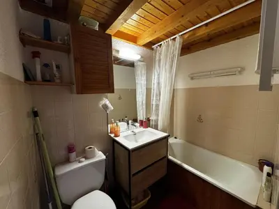 a bathroom with a sink and a toilet and a tub at Studio 4 pers avec balcon, près des remontées mécaniques - FR-1-572-149 in Arâches-la-Frasse
