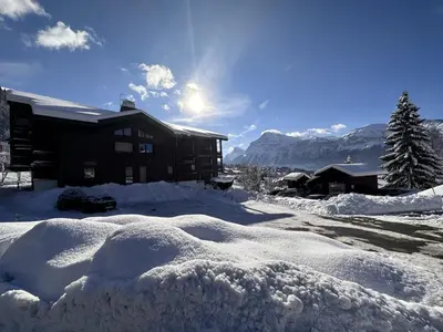 a pile of snow in front of a house at Studio spacieux 4 pers avec parking et lave-vaisselle - FR-1-572-93 in Arâches-la-Frasse