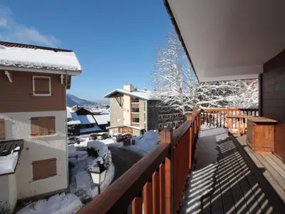 a balcony of a house with snow on the ground at Appartement 3 pièces avec garage, terrasse, proche pistes et commerces à Arâches-la-Frasse - FR-1-572-250 in Arâches-la-Frasse