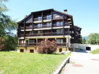 a large building with balconies on the side of it at Charmant studio duplex rénové, 4/5 pers, garage, proche centre, pistes et commerces. - FR-1-572-60 in Arâches-la-Frasse