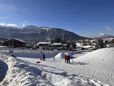 a group of people standing on a snow covered slope at Studio pour 6 pers avec sdd rénovée et parking, sur les pistes - FR-1-572-80 in Arâches-la-Frasse