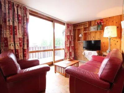 a living room with two chairs and a couch and a television at Spacieux 3 pièces au centre d'Arâches-la-Frasse, 6 pers., proche pistes et commerces - FR-1-572-69 in Arâches-la-Frasse