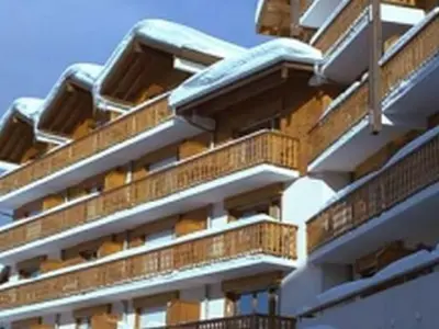 an apartment building with snow on the balconies at 3 pièces familiales, 4 pers, garage, centre des Carroz - FR-1-572-75 in Arâches-la-Frasse