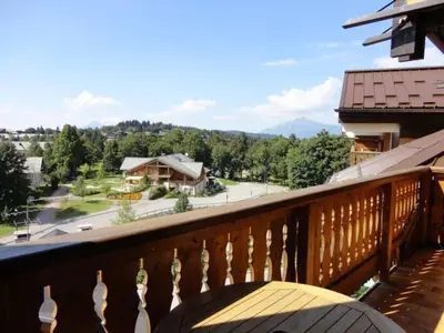 a balcony with a view of a street at 3 pièces familiales, 4 pers, garage, centre des Carroz - FR-1-572-75 in Arâches-la-Frasse