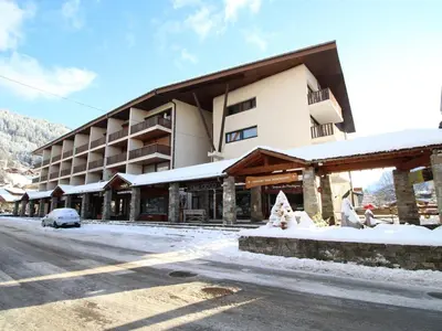 a large building with snow on the ground at Studio 4 pers, cabine, Les Carroz, proche pistes - FR-1-572-95 in Arâches-la-Frasse