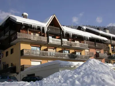 a building with a pile of snow in front of it at Studio pour 4 personnes avec balcon et équipements, au pied des pistes et à 550m du village - FR-1-572-157 in Arâches-la-Frasse