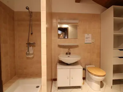 a bathroom with a sink and a toilet and a shower at Duplex 8 pers avec parking, pied des pistes, proche commodités - FR-1-572-127 in Arâches-la-Frasse
