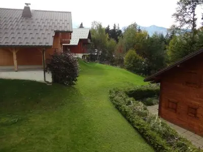 an aerial view of a yard next to a house at Chalet 3 Chambres 8 Pers, 800m Pistes, Parking Couvert, Poêle à Bois, Quartier Calme - FR-1-572-224 in Arâches-la-Frasse